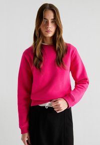 Scalpers Sweater - fucsia