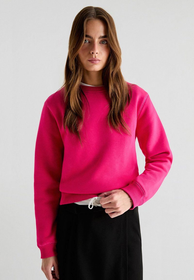 Scalpers Sweater - fucsia