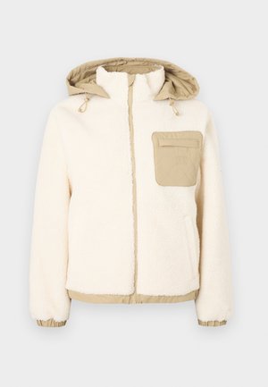 Cream fleece jacket with a beige quilted hood and pocket. Features elastic cuffs and hem, gold zipper, and adjustable drawstrings.