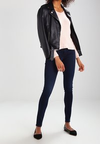 Levi's® Jeans Skinny Fit - blue-black denim