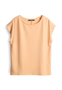 Perzikkleurig t-shirt met korte mouwen en een ronde halslijn, met een losse pasvorm. Gemaakt van een gladde, lichte stof met een eenvoudig, strak ontwerp.