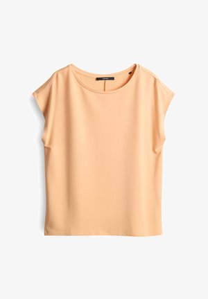 Pfirsichfarbener Kurzarm-Oberteil mit rundem Ausschnitt und lockerer Passform. Hergestellt aus einem glatten, leichten Stoff mit einem einfachen, klaren Design.