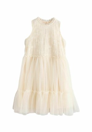 Vestido crema sin mangas con detalles de encaje en el cuerpo y falda de tul translúcido en capas con dobladillo con volantes.