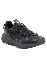 Scarpa da trekking nera con rinforzo sulla punta, sistema di lacci elastico a sgancio rapido e suola Vibram progettata per supporto e durata all'aperto.
