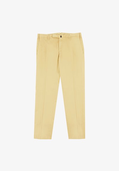 Jasnożółte spodnie wykonane z gładkiego materiału, charakteryzujące się prostym krojem nogawek, szlufkami na pasek i bocznymi kieszeniami. Proste, czyste linie.