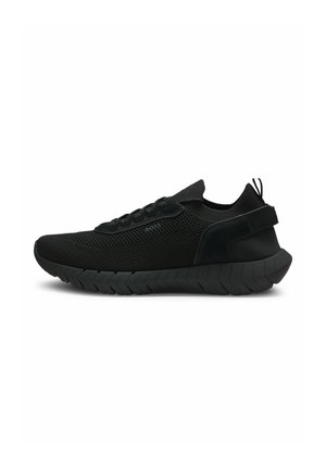Black low-top sneaker with breathable mesh upper, textured rubber sole, lace-up closure, and branded "BOSS" on side.