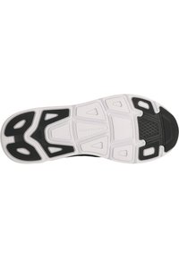 Svart atletisk skosula med texturerade vita gummimönster och spår för grepp, med en hållbar svart yttre sektion.