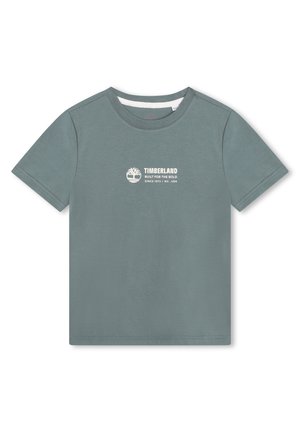 Kortærmet, afdæmpet grøn Timberland T-shirt med hvidt logo og tekst "Built for the bold since 1973 / NH, USA" på brystet.