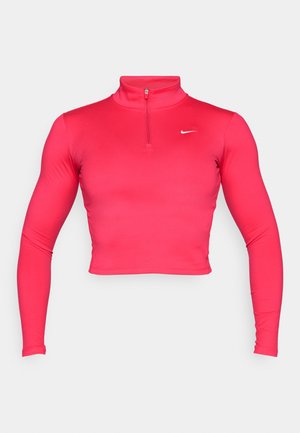 Rosa, kortkort langermet treningstopp med høy krage og kvart glidelås. Laget av glatt, elastisk stoff med en liten hvit logo.
