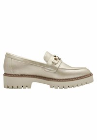 Beige Leder Slipper mit einer metallischen Schnalle, runder Zehenpartie und dicker, gerillter Sohle. Verfügt über eine gestickte Verzierung entlang der Kante.