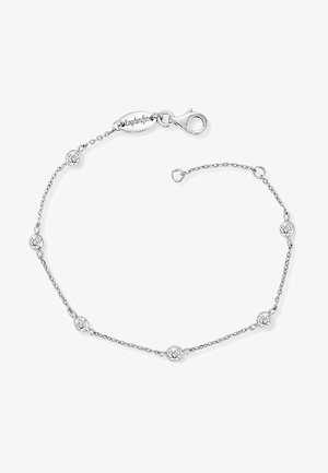 Sølvarmbånd med runde cubic zirconia accenter, forbundet med en fin kæde. Har en klipslås og et indgraveret logo-tag.