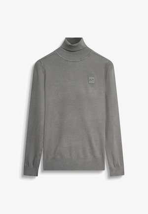 Sivi turtleneck pulover od glatkog materijala, s rebrastim ovratnikom, dugim rukavima i malim embosiranim logom na prsima.