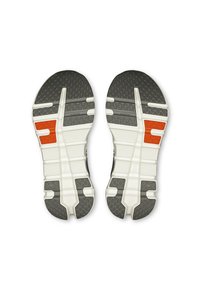 Plantillas de zapatos con una superficie de goma gris texturizada, con acentos blancos y una sección de color naranja brillante. Patrón de banda de rodadura único para un mejor agarre.