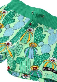 Green shorts with cactus pattern featuring various shades of green and blue, elastic waistband with drawstring, and a small brand logo.
