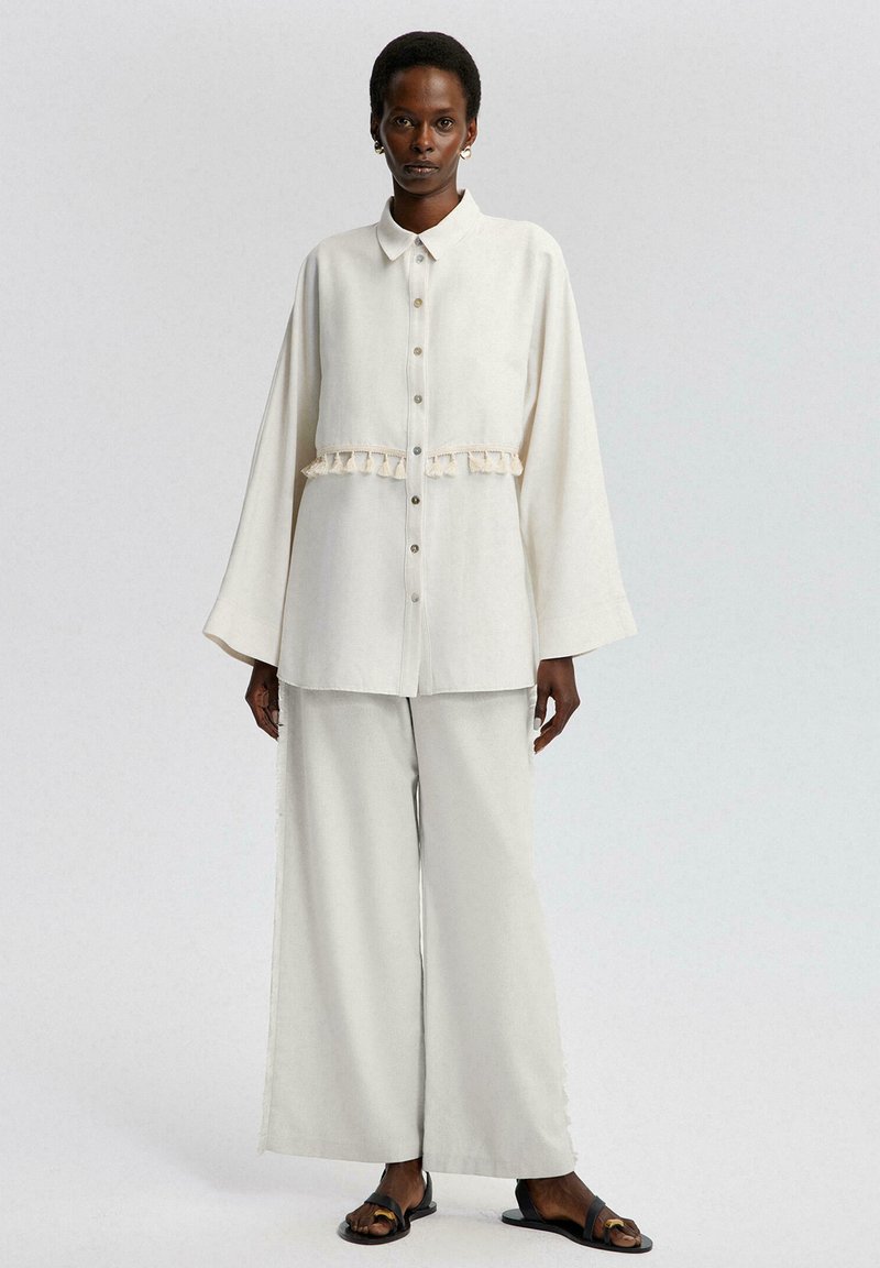 Touché Privé Overhemdblouse crème Touché Privé Overhemdblouse crème