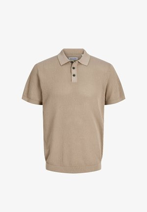 Beež lühikeste varrukatega kootud polosärk, millel on kolm musta nööpi ning soonikkrae ja -ääris.