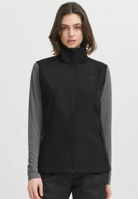 Czarna izolowana kamizelka z wysokim kołnierzem i zapięciem z przodu. Posiada dwie boczne kieszenie oraz elegancki design, wykonana z gładkiego, trwałego materiału.