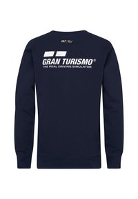 Marinblå sweatshirt i bomull. Har rundhals och långa ärmar, samt vit tryckt text: "GRAN TURISMO" och "THE REAL DRIVING SIMULATOR."