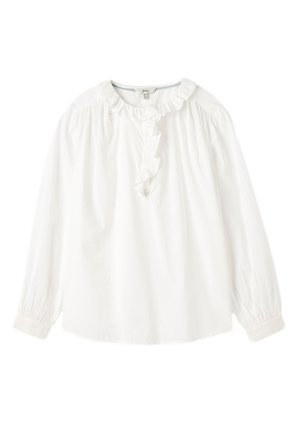 Blouse blanche à manches longues avec col à volants et patte de boutonnage devant, poignets froncés et coupe ample.