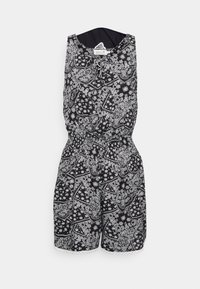 Svartvit mönstrad overall med blommönster och paisleymönster, resår i midjan och spetskantad fåll. Kort längd, ärmlös.