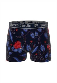 Boxer briefs à motif floral bleu et rouge sur fond sombre. Dotés d'une ceinture élastique grise avec le logo "pierre cardin".