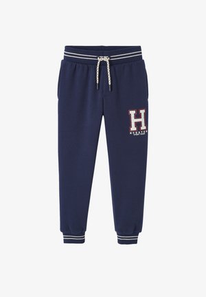 Marineblaue Sweatpants aus Baumwollmischung, mit einem elastischen Bund mit Kordelzug, umgenähten Säumen und einem Logopatch auf dem linken Oberschenkel.