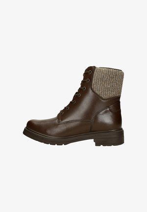 Bottine marron en cuir à lacets avec semelle épaisse et bord en tissu tricoté.