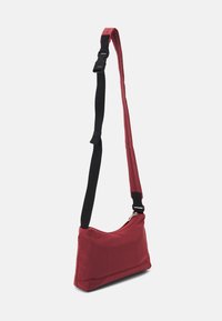 Calvin Klein Jeans CITY SHOULDER BAG - Borsa a tracolla - terracotta tile