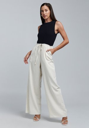 PAIGE JUMPSUIT - Pajac - black and natural