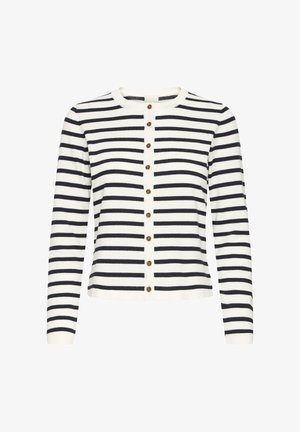 Kremi spalvos susagstomas megztinis su tamsiai mėlynomis horizontaliomis juostelėmis. Turi apvalią iškirptę ir medinius sagomis priekyje. Ilgos rankovės ir minkšta tekstūra.