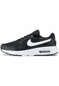 Chaussure de sport noire avec des matériaux en mesh et cuir lisse. Comprend le logo Nike blanc, un col rembourré et un amorti à air visible au talon.