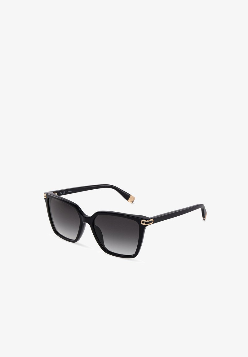 Lunettes de soleil à monture carrée noire avec verres dégradés foncés et petits accents dorés aux coins et aux extrémités des branches.