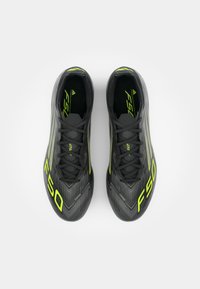 adidas Performance F50 PRO FG - Firm-ground football boots - core black/iron metallic/lucid lemon