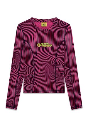 Long-sleeve pink top with black wavy stripes, yellow-green "Hysteric Guess Jeans" logo at center chest, and visible black stitching details.