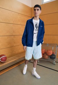 Nike Performance DNA SHORT - Sports shorts - glacier blue/barely volt/bright mandarin