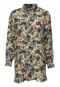 Chemise à boutons florale avec un fond beige ornée de motifs de feuilles bleues, vertes et noires. Tissu doux, manches longues avec des poignets à boutons.