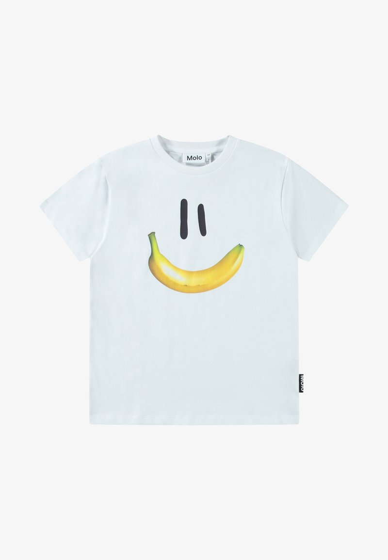 Balts kokvilnas T-krekls ar grafiku, kurā attēlota banana un melnās smaidošās sejas elementi. Vienkāršs dizains, īsas piedurknes, ar sānu birku.