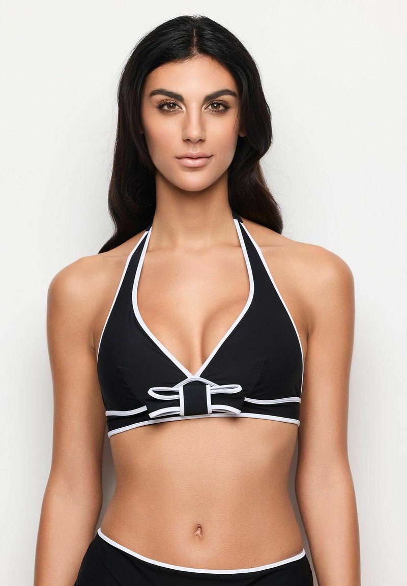 Svart halterneck bikiniöversdel med djup urringning, vit trim och en rosett i mitten. Slät tyg med tonalt kontrast.