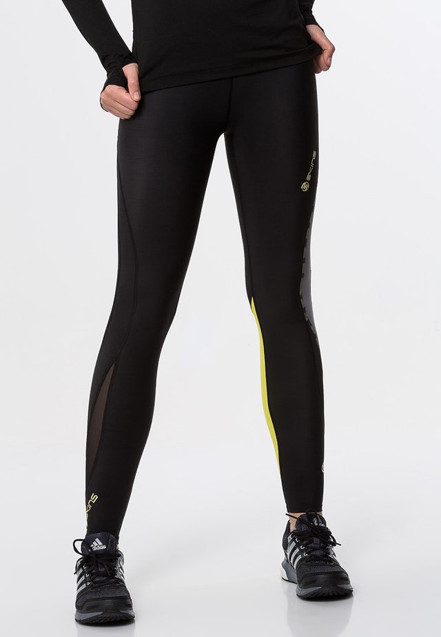 DNAMIC - Leggings - black/limoncello