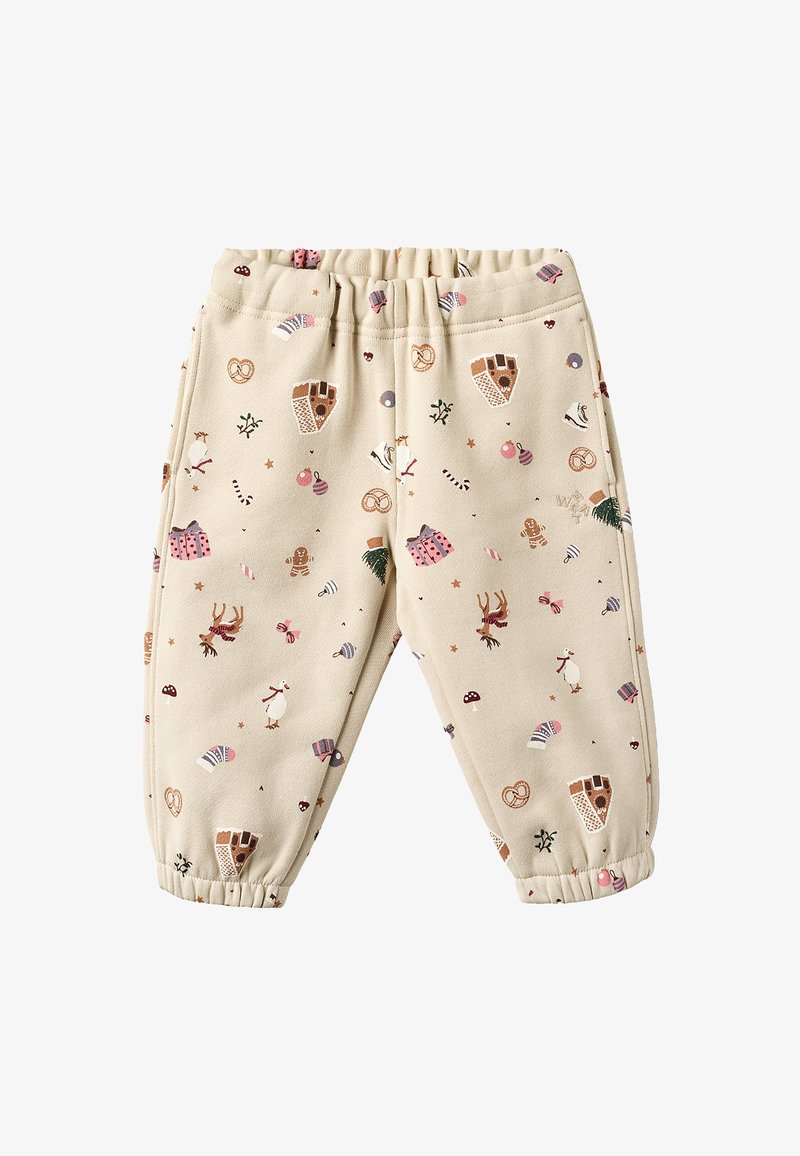 Beige bukser med elastisk midje, med et lekent mønster av pepperkakehus, reinsdyr og festlige ornamenter i ulike farger.