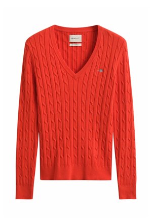 Maglione rosso a costine con scollo a V e maniche lunghe, orlo e polsini a coste, con piccolo logo ricamato sul petto a sinistra.