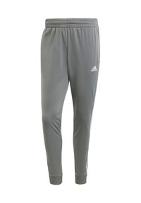 Šedé športové tepláky s elastickým pásom, taperovaným strihom a bielym logom Adidas. Vyrobené z ľahkej a hladkej látky.