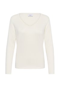 V-neck long-sleeve top in soft white knit fabric. Features a scalloped hem and simple stitching. Label reads "Saint" at the neckline.