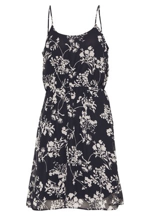 Schwarzes ärmelloses Kleid mit dünnen Trägern, weißem Blumenmuster und tailliertem Schnitt, knielanger Saum.