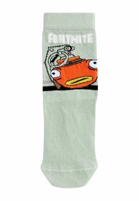 Heledad rohelised sokid, millel on illustratsioon oranžist tegelasest suurte silmade ja pruunist mütsiga, koos tekstiga "FORTNITE."