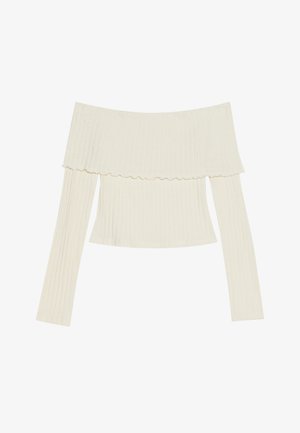 Off-shoulder ribbad topp i krämfärg, med en volangkant i halsen och långa ärmar med en figurnära silhuett. Allt är i en jämn textur.