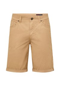 Tan fabric shorts with a straight cut, featuring cuffed hems, front pockets, and a small branded tag on the waistband.
