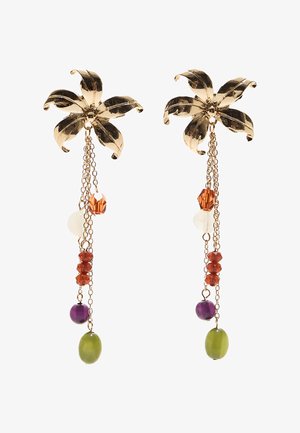 Gold metal earrings featuring palm leaf designs with hanging strands of colorful beads in orange, purple, green, and white.