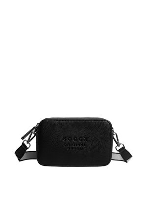 Black textured crossbody bag with two zipper pulls, adjustable black and white strap, and embossed "SOCCA ORIGINAL BRAND" logo on front.