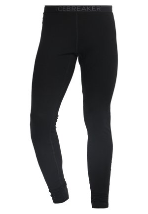 Zwarte Leggings van zacht materiaal met een gladde afwerking. Voorzien van een elastische tailleband met het logo "ICEBREAKER" en platte naden voor comfort.